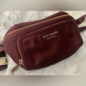 Kate Spade Maroon Belt Bag with Gold Accents